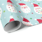 Niedliche Santas mit festlichen Bärenblauen Geschenkpapier (Rolleneckpunkt)