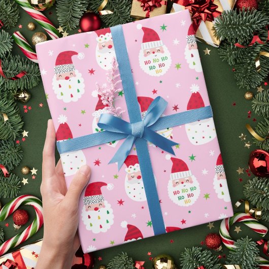 Niedliche Santas mit festlichen Bärten rosa Geschenkpapier