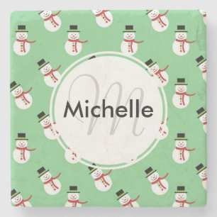 Niedliche Schneemänner im grünen Hintergrund Steinuntersetzer