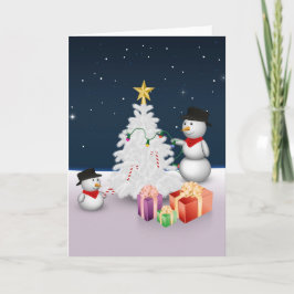 Niedliche Schneemänner mit Weihnachtsbaum Feiertagskarte