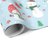 Niedliche Schneemänner mit Weihnachtsbäumen auf he Geschenkpapier (Rolleneckpunkt)