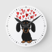 Niedliche Schwarz-Tan-Dackel mit Herz