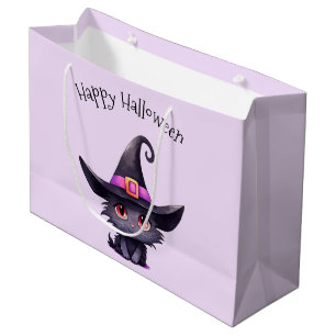 Niedliche Schwarze Katze, die ein Hexenhutehl träg Große Geschenktüte