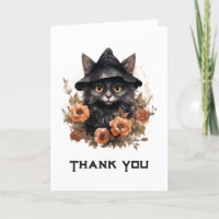 Niedliche schwarze Katze in einem Hexenhut