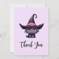 Niedliche schwarze Katze mit Hexenhut