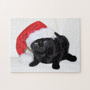 Niedliche schwarze Katze mit Weihnachtsmannmütze Puzzle