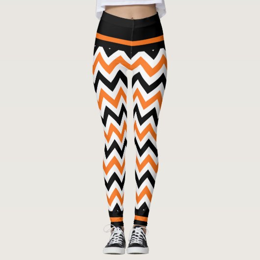 Niedliche schwarze orange Zickzack Leggings (Vorderseite)