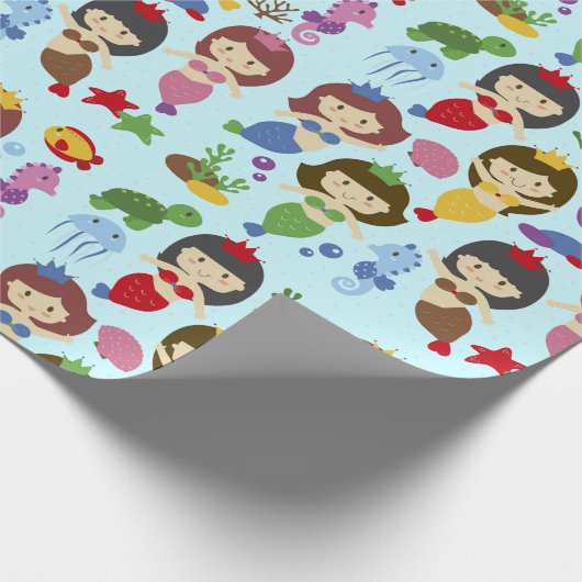 Niedliche Schwimmen chibi Meerjungfrauen unter Geschenkpapier (Ecke)