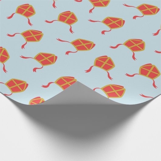 Niedliche Sinterklaas-Mijters auf hellblau Geschenkpapier (Ecke)