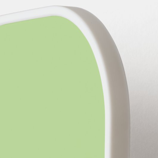 Niedliche Springererbsen in der Darstellung des Ca Pickleball Schläger (Linke Seite)