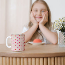 Niedliche Tasse des Herzens