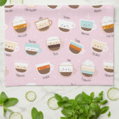 Niedliche Tassen Kaffee auf hellrosa Geschirrtuch (Gefaltet)