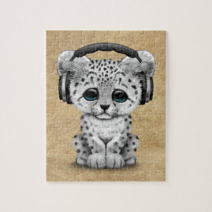 Niedliche tragende Kopfhörer Schneeleopard CUBs D Puzzle