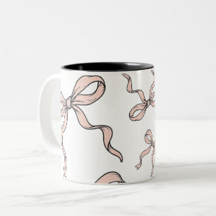 Niedliche, trendige rosafarbene Bogen in schwarz Zweifarbige Tasse