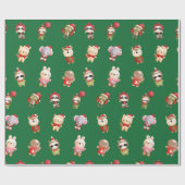 Niedliche und erfreuliche Weihnachtsbabys grün Geschenkpapier (Flach)