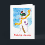 Niedliche walisische Weihnachtskarte, Snowman und  Feiertagskarte<br><div class="desc">Eine lustige Weihnachtskarte mit Frohen Weihnachten in Walisisch und ein Rotkehlchen,  der auf dem Hut des Schneemanns gelandet ist und die heiligen Beeren genießt. Aus einer skurrilen,  handbemalten Illustration von Judy Adamson.</div>