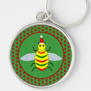 Niedliche Weihnachtsbäume und Poinsettia-Blume Schlüsselanhänger