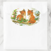 Niedliche Weihnachtsfoxen Ovaler Aufkleber (Tasche)