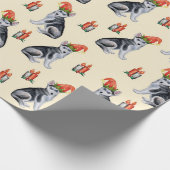 Niedliche Weihnachtshunde mit Weihnachtsmannmützen Geschenkpapier (Ecke)