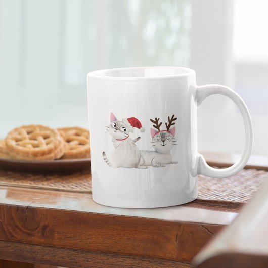 Niedliche Weihnachtskatzenwelt Weihnachtsmannmütze Kaffeetasse
