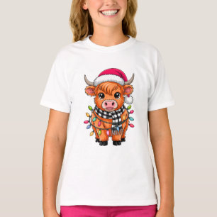 Niedliche Weihnachtskuh mit Weihnachtsmannmütze un T-Shirt