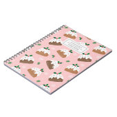 Niedliche Weihnachtspudding auf hellrosa Notizbuch Notizblock (Linke Seite)