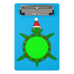 Niedliche Weihnachtsschildkröte mit blühender Musc Mini Klemmbrett