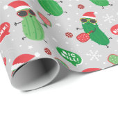 Niedliche Weihnachtsschlecken auf hellgrau Geschenkpapier (Rolleneckpunkt)