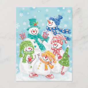 Niedliche Weihnachtsschneefamilie im Schnee Feiertagspostkarte