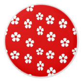 Niedliche weiße Blume auf rot Keramikknauf (Vorderseite)