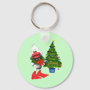 Niedliche weiße Weihnachtsente mit einem Kranz Schlüsselanhänger