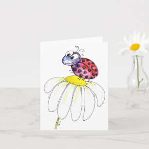 Niedliche Whimsical Red Ladybug auf einer weißen B Karte