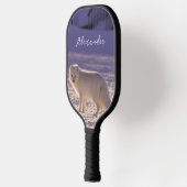 Niedliche Winterfotografie des Schneefräses Pickleball Schläger (Links)