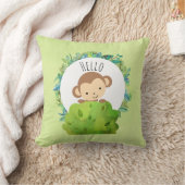 Niedlicher Affe, der aus Hinter Bush herausholt Kissen (Decke)