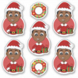 Niedlicher afrikanischer Weihnachtsjunge Cartoon Aufkleber<br><div class="desc">Set von sieben Vinyl-Aufklebern mit einer Illustration eines niedlichen kleinen,  glücklichen afroamerikanischen Jungen,  der in Weihnachtskleider gekleidet ist und einen roten Hut des Weihnachtsmannes trägt; fünf Aufkleber des Jungen und zwei Aufkleber mit einem Weihnachtskranz</div>