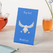 Niedlicher Albatross-Vogel mit Cartoon Sockelschild (In SItu)