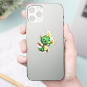Niedlicher Baby Dragon mit Tourch He Lite Aufkleber (Telefon)