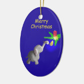 Niedlicher Baby-Elefant beleuchtet ein Keramik Ornament (Links)