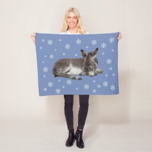 Niedlicher Babydonkey mit Schneeflocken in Blau Fleecedecke