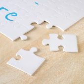 Niedlicher BabyFox malt blaues Puzzle (Seite)