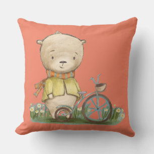 niedlicher Bär auf der Wiese mit einem Fahrrad Kissen