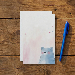 Niedlicher blauer Bär mit weichem pastellfarbenem Briefpapier