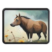 Niedlicher brauner Pony im Blumenfeld