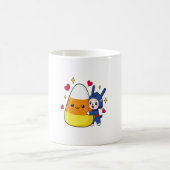 Niedlicher Bunny Hugging Candy Corn Kaffeetasse (Mittel)