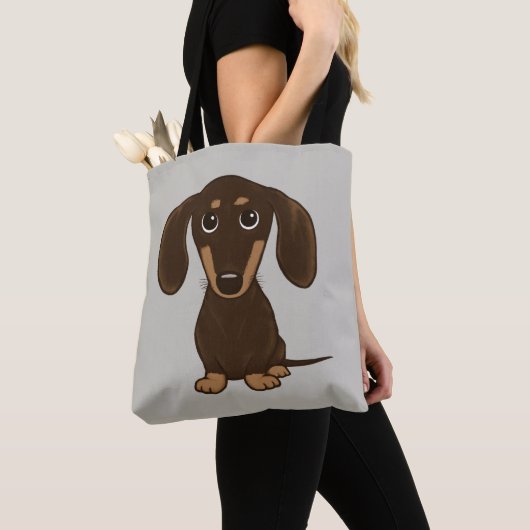 Niedlicher Cartoon-Dackel-Hund der Tasche (Von Nahem)