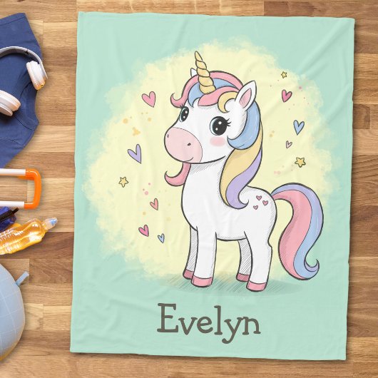 Niedlicher Cartoon Einhorn mit Regenbogenmane Fleecedecke
