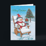 Niedlicher Cartoon Snowman Feiertagskarte<br><div class="desc">Eine Weihnachtskarte mit einem niedlichen Schneemann,  der sich auf einem Holzstuhl entspannt,  inmitten eines zauberhaften Winterwunderlandes.</div>