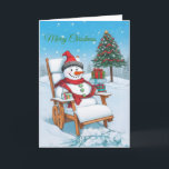 Niedlicher Cartoon Snowman Feiertagskarte<br><div class="desc">Eine Weihnachtskarte mit einem niedlichen Schneemann,  der sich auf einem Holzstuhl entspannt,  inmitten eines zauberhaften Winterwunderlandes.</div>