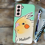 Niedlicher Cockatiel Bird Doodle Parrot Green Samsung Galaxy Hülle<br><div class="desc">Diese hübsche Telefonzelle mit Cockatiel Doodle kann mit jedem Namen personalisiert werden,  um dem Besitzer des Haustiervogels ein süßes Geschenk zu machen. Genießen Sie die Herzen und die Leidenschaft für die Birben; die weiße und gelbe "Titel in einem Pop Art Stil ist lustig und stilvoll auf trendigem Meeresgrün.</div>