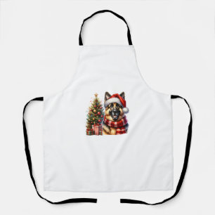 Niedlicher deutscher Schäferhund Weihnachtsmannmüt Schürze